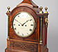 A Regency inlaid mahogany bracket clock.