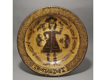 An antique slipware charger.