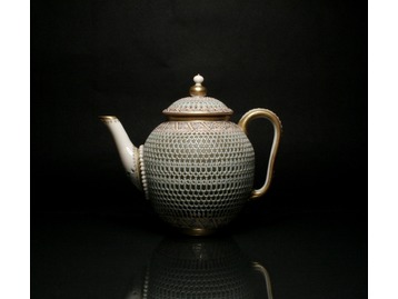 A Royal Worcester teapot by George Owen.