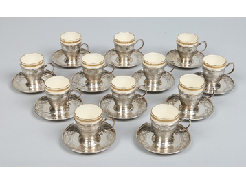 A set of twelve Lenox porcelain demitass
