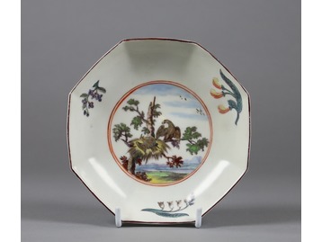 A Chelsea fable painted saucer.