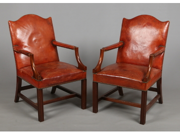 A pair of mahogany Gainsborough armchair