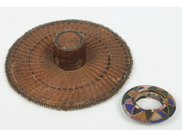 A Peruvian caneware hat with beadwork de