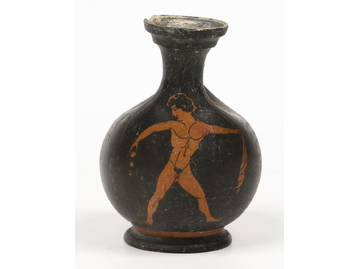 An ancient Greek terracotta askos. With 