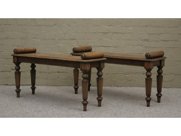 A pair of Regency hall benches.