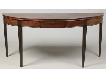 A 19th century bow front serving table. 