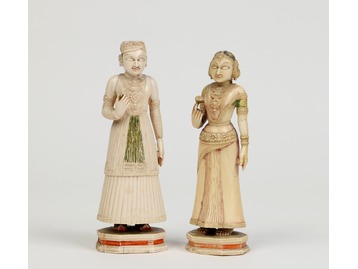 A pair of Indian ivory figures.