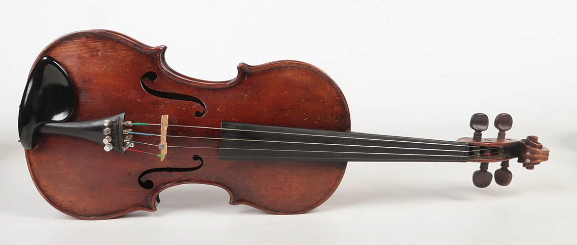 A cased violin and bow. Label for John B