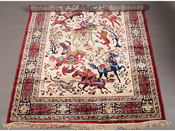 Red ground Kashmir rug with a traditiona