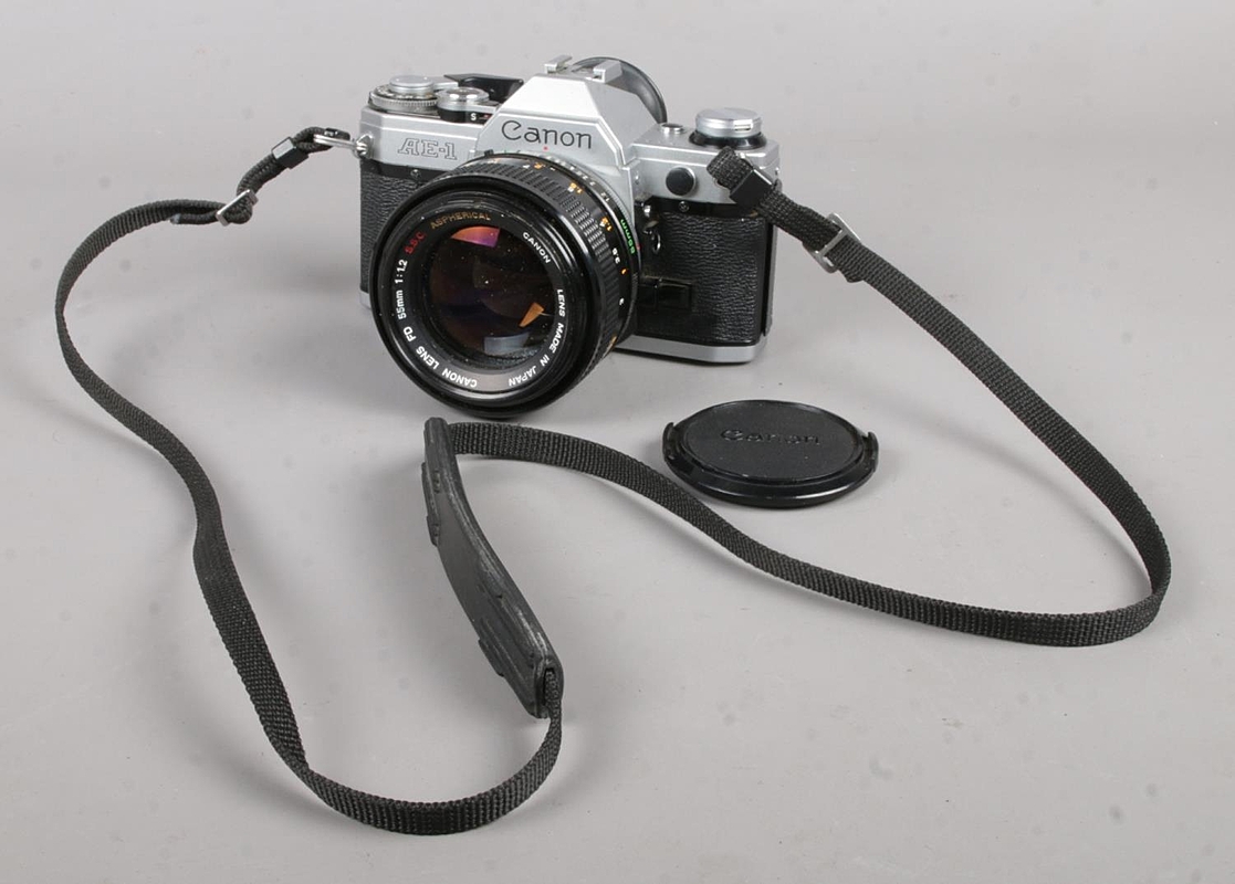 A Canon AE-1 camera with Canon FD 55mm l