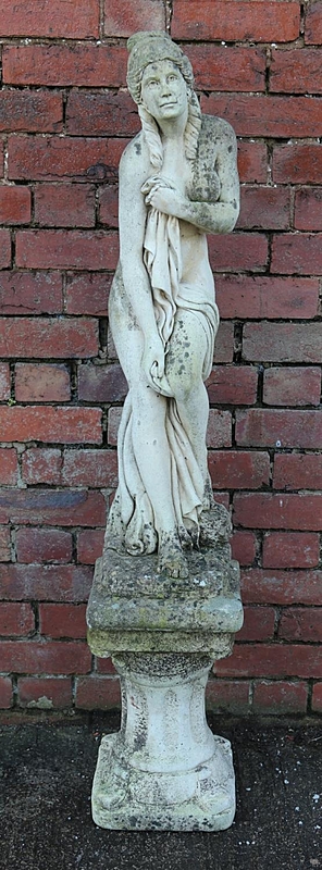 A large cast concrete garden statue form