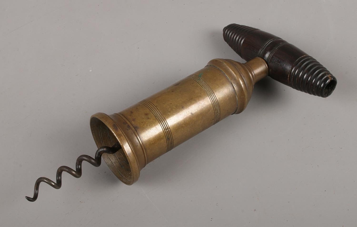 A Thomason style corkscrew with brass cy