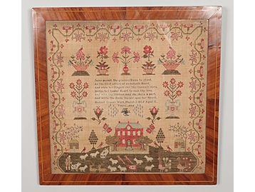 A George IV rosewood framed sampler by H