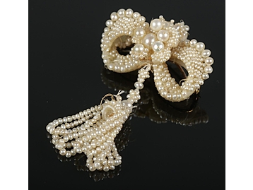 A Georgian seed pearl brooch. Formed as 