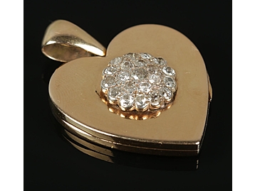 An 18ct gold heart-shaped locket, with d