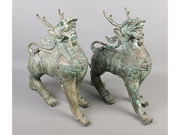 A pair of bronze Tibetan style Qilin/Gil