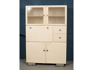 A 1960s painted kitchen utility cabinet.