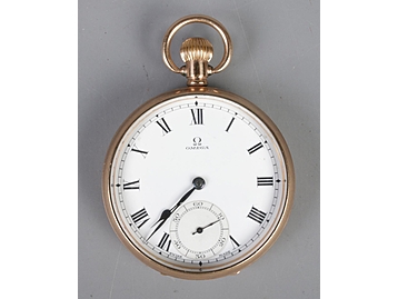A yellow metal Omega pocket watch. With 