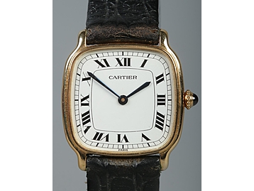 An 18ct gold Cartier manual wristwatch. 