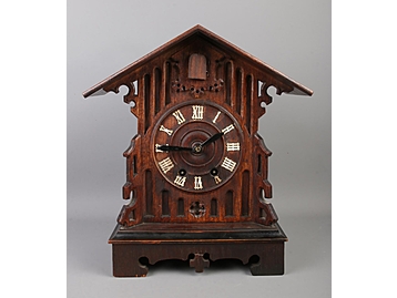 A Black Forest cuckoo clock, with roman 