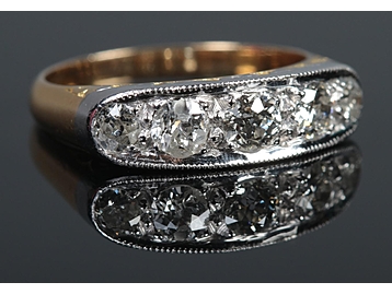 An 18ct Gold and Platinum five stone dia