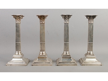 A set of four Victorian silver candlesti