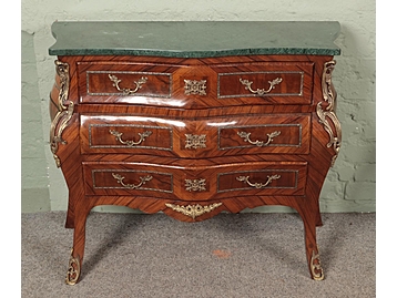 A French kingwood bombe shaped chest of 