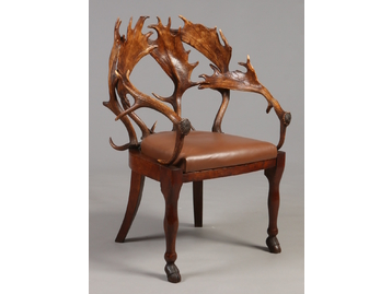 A 19th century antler back elbow chair o
