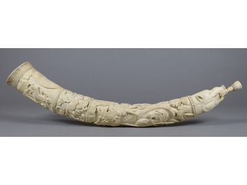Carved ivory tusk.