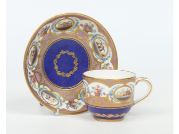A Sevres coffee cup and saucer. With too