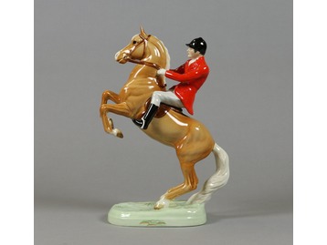 A Beswick horse and rider.