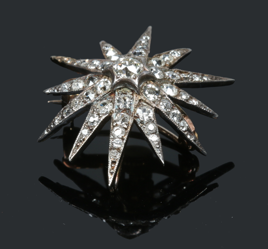 An Edwardian diamond starburst brooch pe