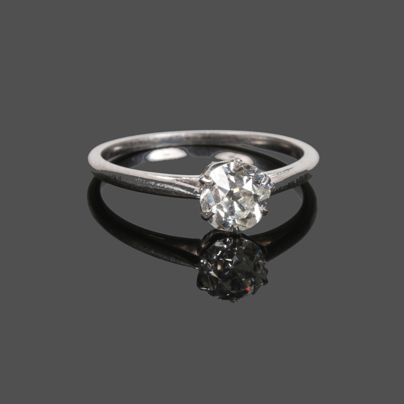 An antique diamond solitaire ring. Set w