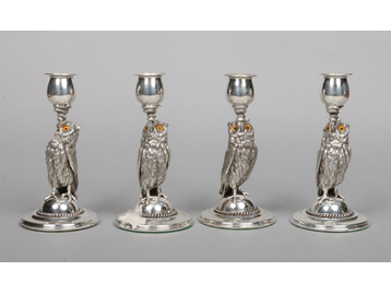 A set of four zoomorphic silver plated t